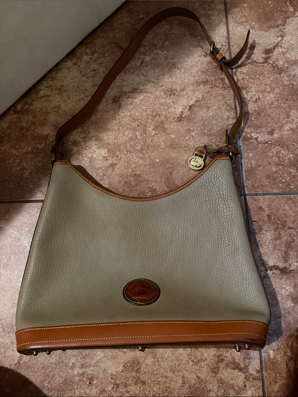 Dooney & Bourke Pebbled Taupe Shoulder Bag with Tan Trim